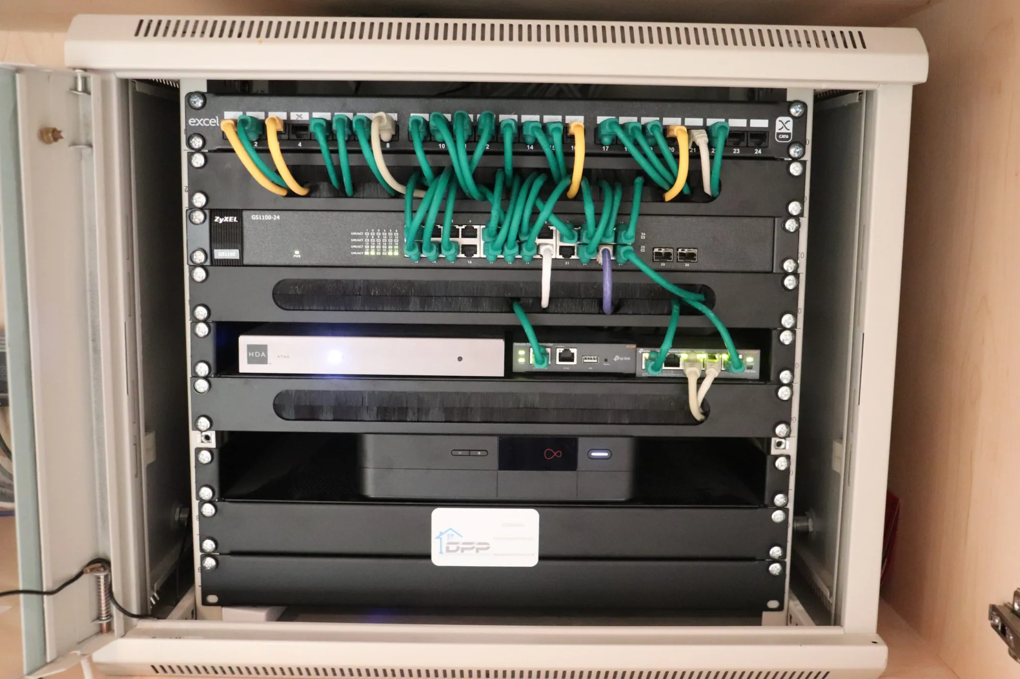 Network data cabinet with patch panel and switches, smart office Kent installation